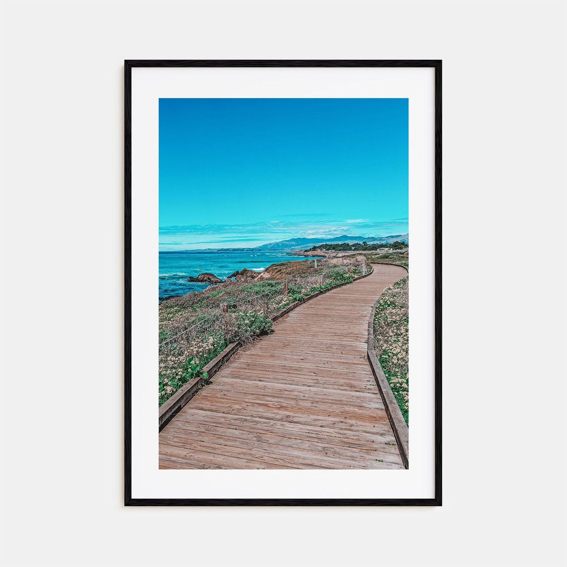 Wooden Boardwalk Curving Along a Coastal Bluff Overlooking Ocean Print