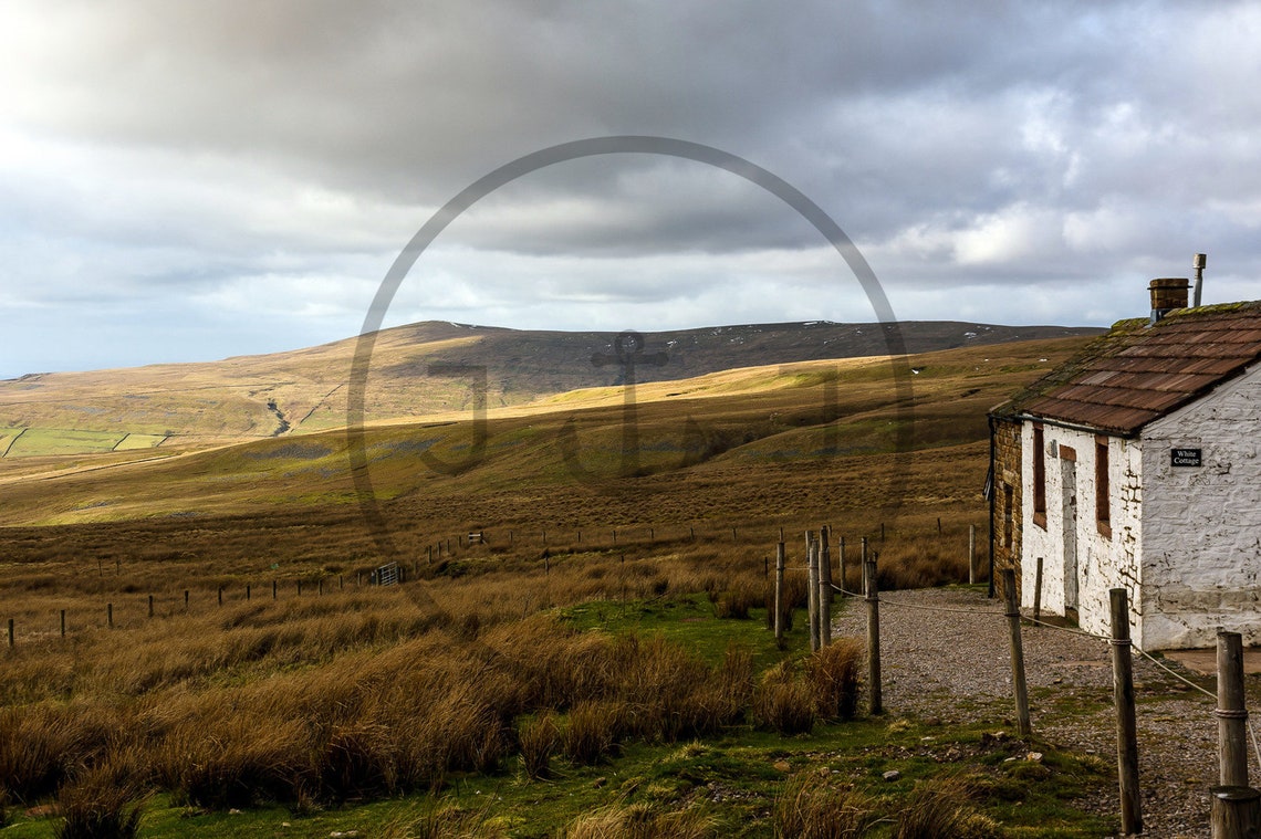 Weathered Stone Bothy Standing Alone on a Windswept Moorland Poster - Image 3
