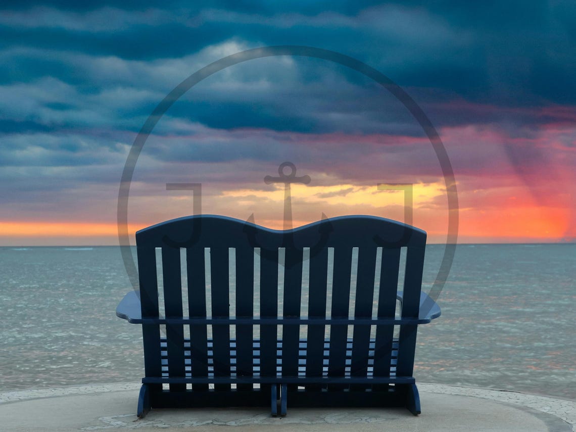 Blue Double Beach Chair Facing the Ocean at Golden Sunset Poster - Image 3