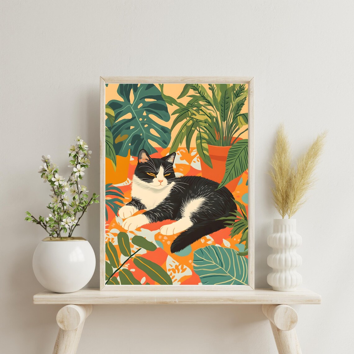 Relaxed Black and White Cat Lounging Among Monstera Leaves Poster - Image 2