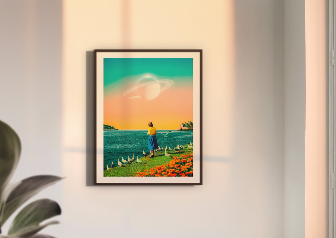 Woman Feeding Seagulls Beneath Giant Ringed Planet Sunset Poster - Image 2