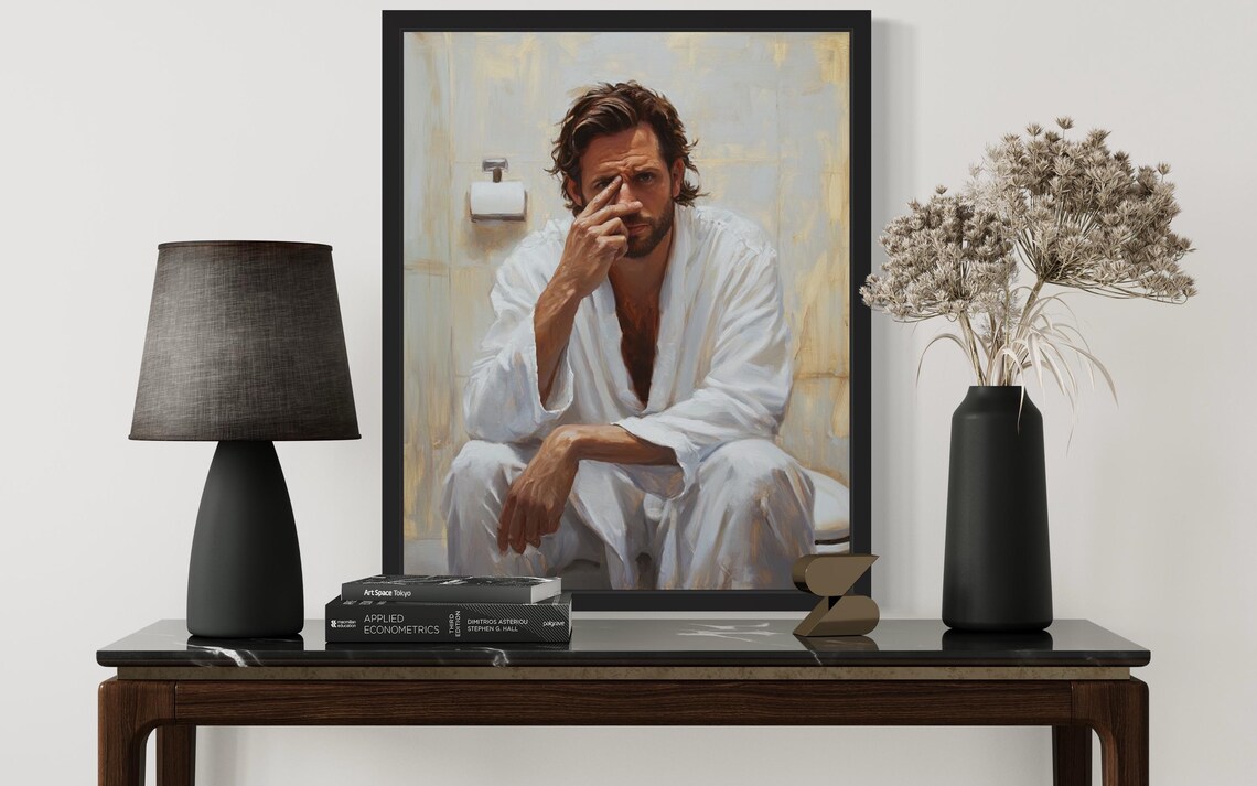 Bearded Man in White Robe Holding Nose by Toilet Paper Poster - Image 4