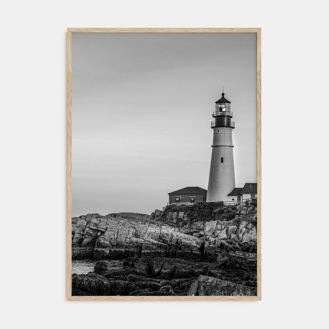 Lighthouse on Rocky Shore Black and White Coastal Photo Poster