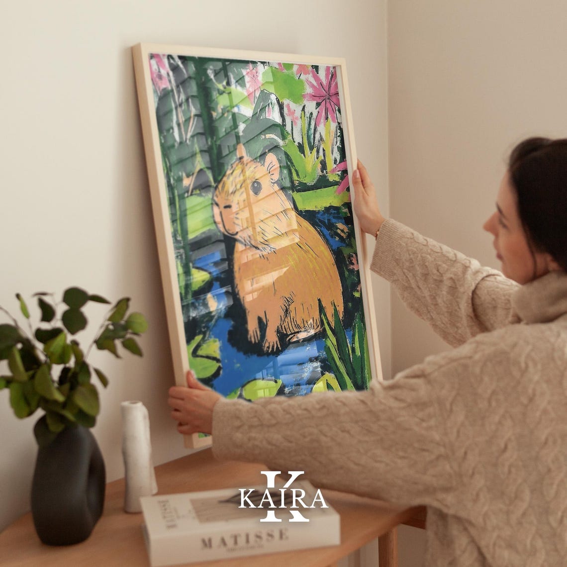 Relaxed Capybara Sitting by a Pond Full of Lily Pads and Blooms Poster - Image 2