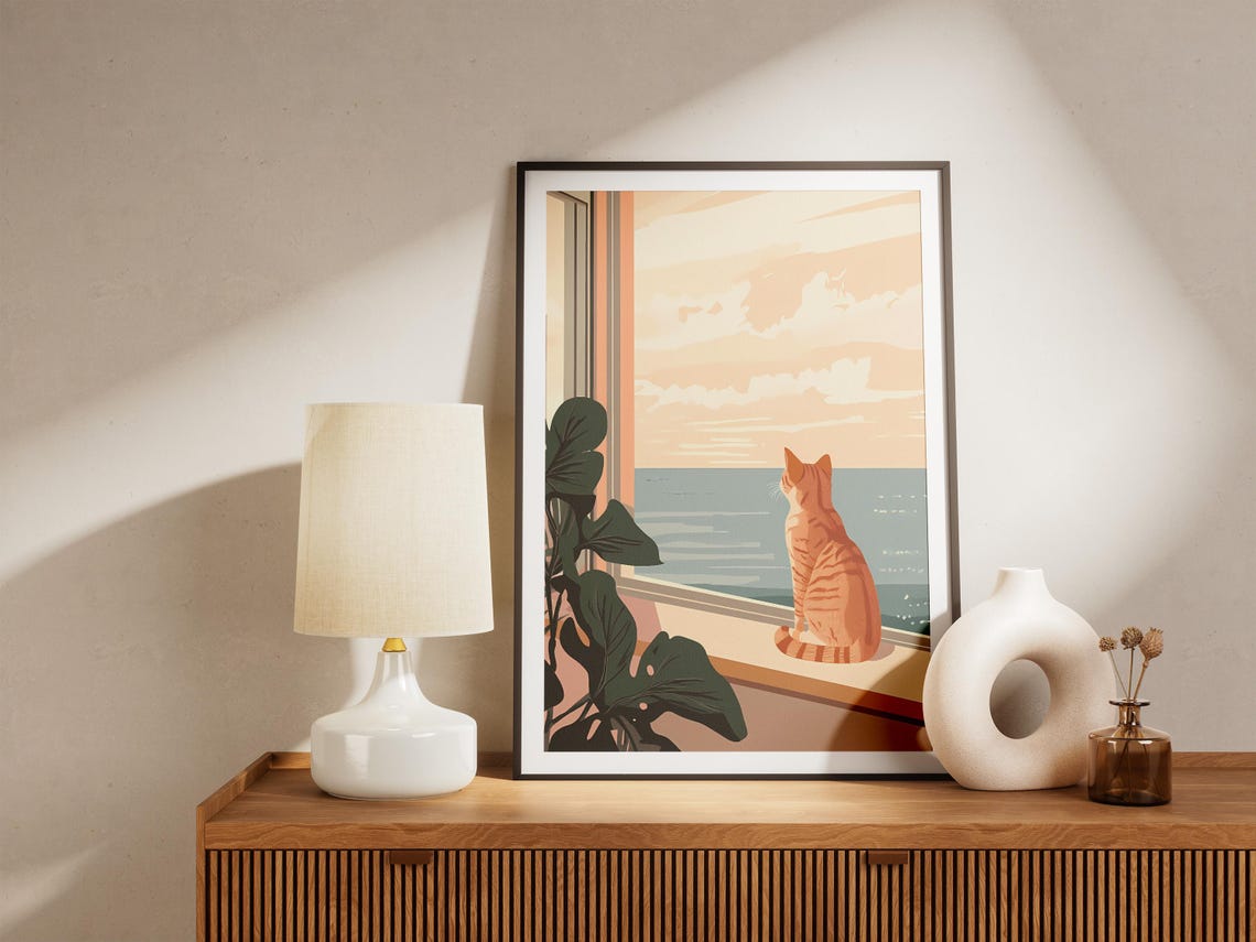 Sunlit Orange Tabby Cat on a Windowsill Gazing at the Ocean Poster - Image 5