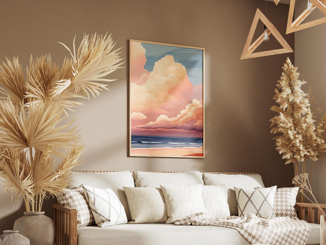 Pastel Clouds Towering Over a Peaceful Sunset Beach Shore Poster - Image 3