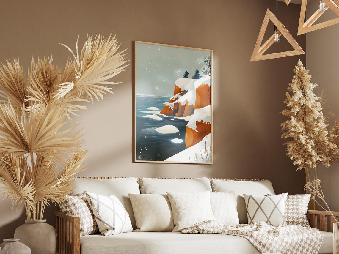 Snowy Orange Cliffs Along a Deep Blue Sea in Falling Snow Poster - Image 3