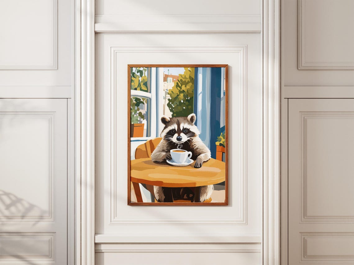 Raccoon With Steaming Coffee At A Round Wooden Cafe Table Poster - Image 2