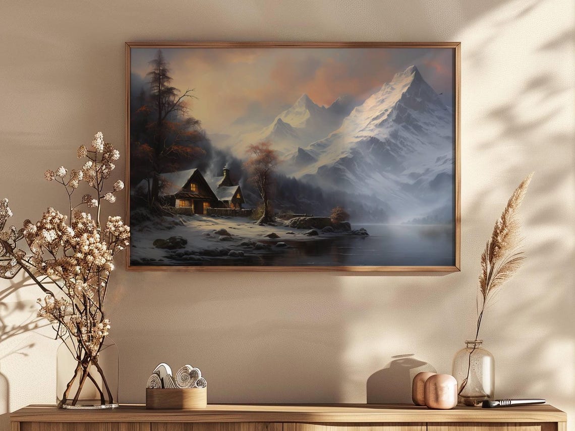 Winter Cabin Glowing by a Frozen Lake Beneath Snowy Peaks Poster - Image 2