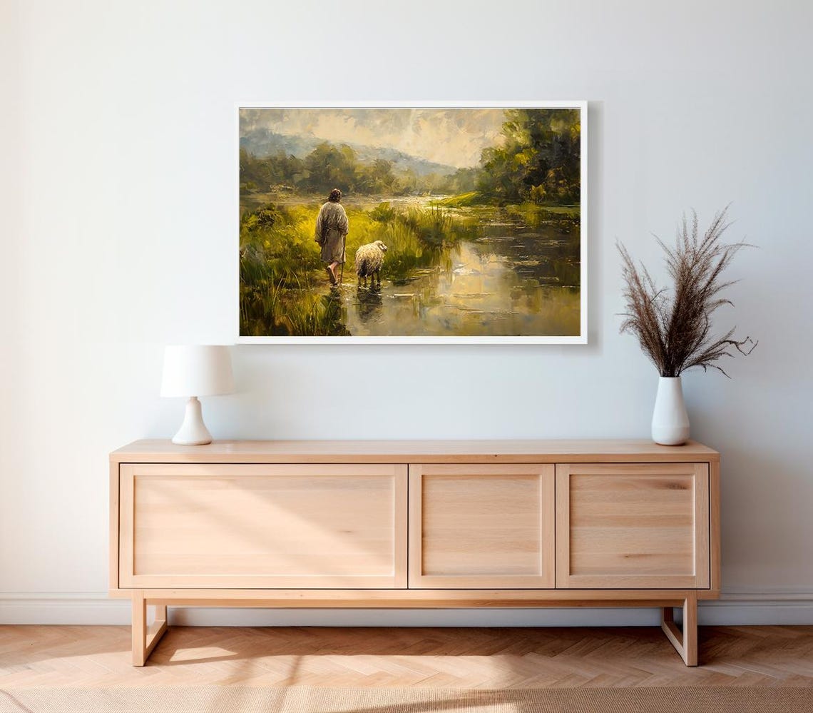 Jesus Leading a Sheep Through a Lush Green Lakeside Meadow Poster - Image 2