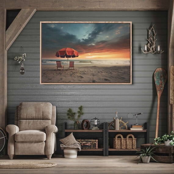 Red Beach Umbrella And Two Chairs At Sunset Over Ocean Waves Poster