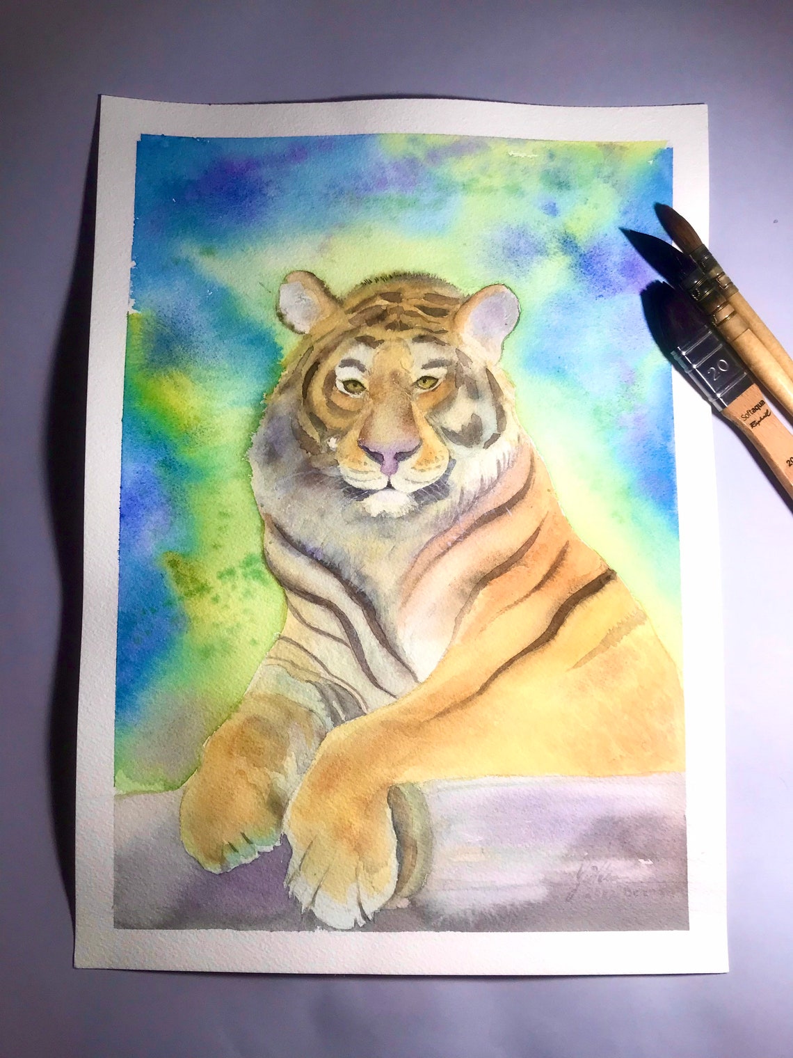 Majestic Tiger Resting Against a Blue Green Wash Watercolor Poster - Image 2