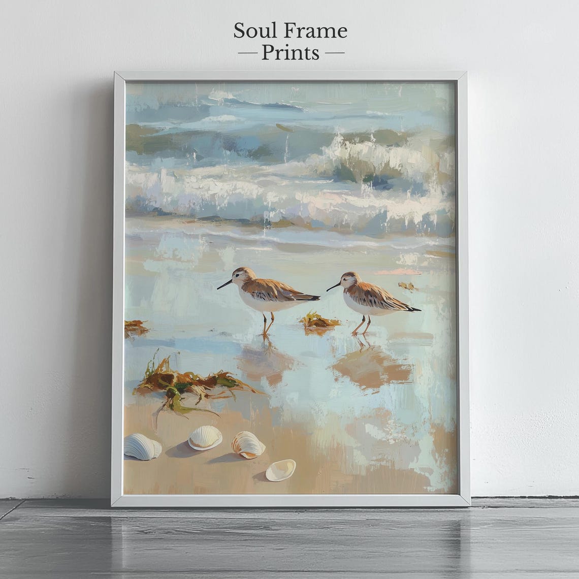 Two Sandpipers Foraging On A Shell Strewn Ocean Shoreline Poster