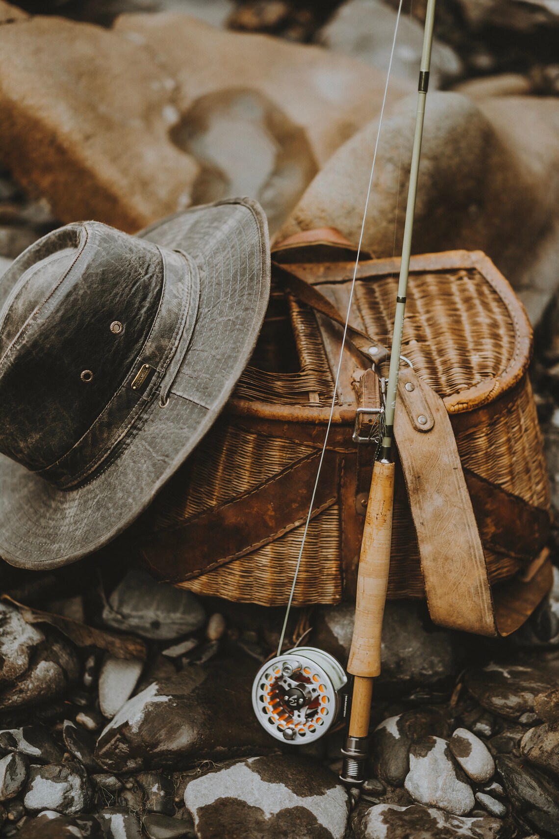 Vintage Fly Fishing Gear Hat Creel Rod on River Rocks Photo Poster
