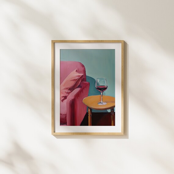 Evening Red Wine Glass on Side Table by Pink Armchair Poster