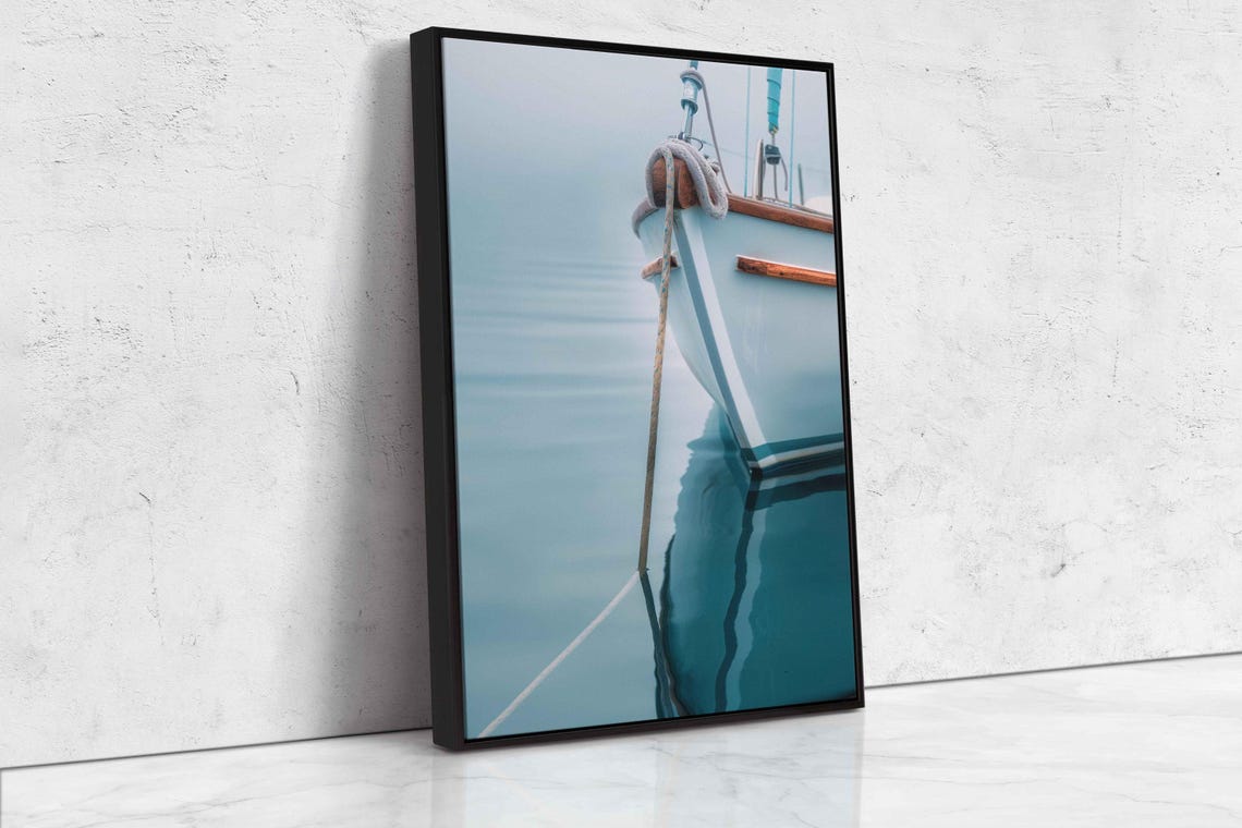 Sailboat Bow With Mooring Rope Over Calm Reflective Water Poster - Image 4