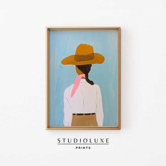 Coastal Cowgirl in a Mustard Hat and Pink Scarf Seen From Behind Poster