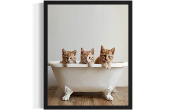 Three Orange Kittens Peeking Over a White Bathtub Photo Poster