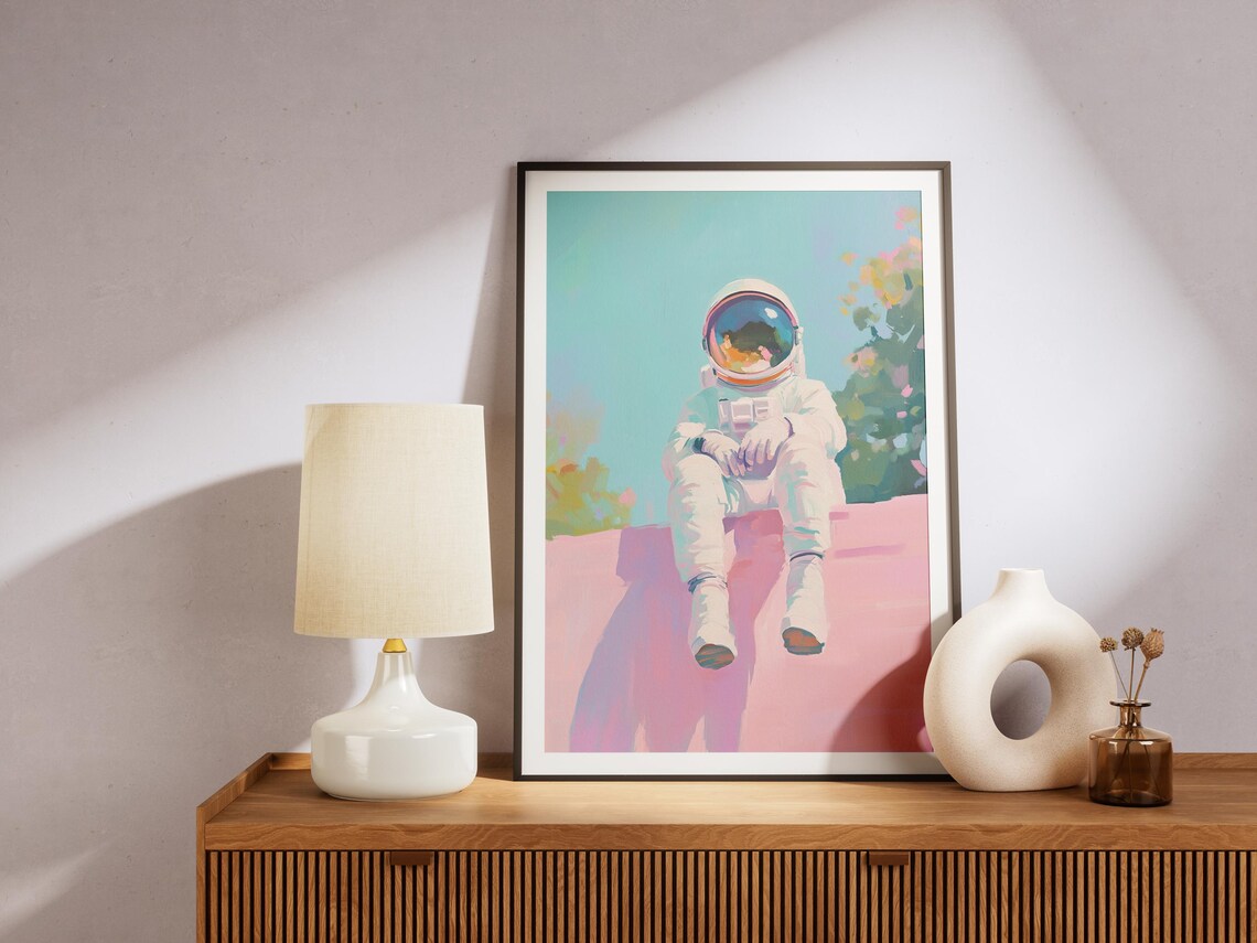 Cute Astronaut Resting on Pink Ledge Under Teal Sky Pastel Space Art Poster - Image 4