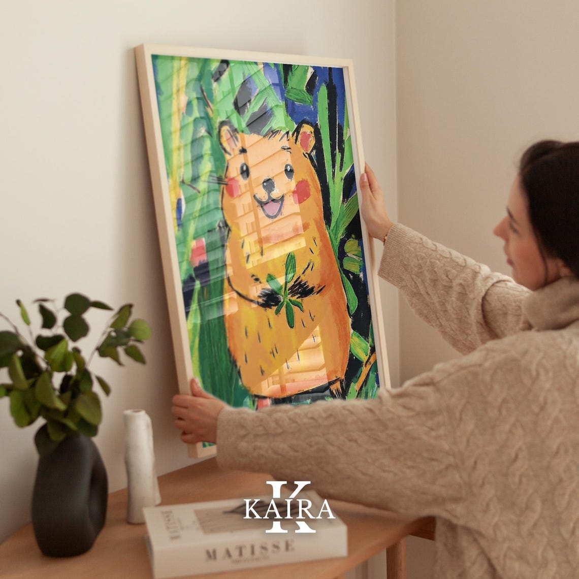 Smiling Orange Hamster Holding a Green Leaf Among Foliage Poster - Image 2