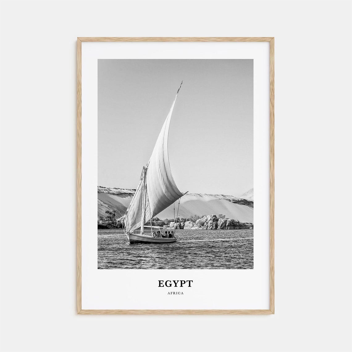 Egypt Felucca Sailboat Gliding on the Nile River Near Cliffs Poster