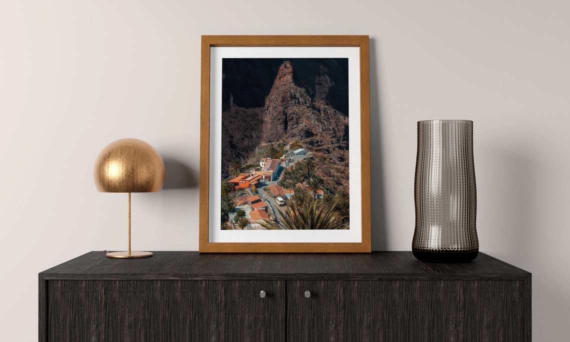 Mountain Village Under Dramatic Cliffs Palm Trees Landscape Poster - Image 3