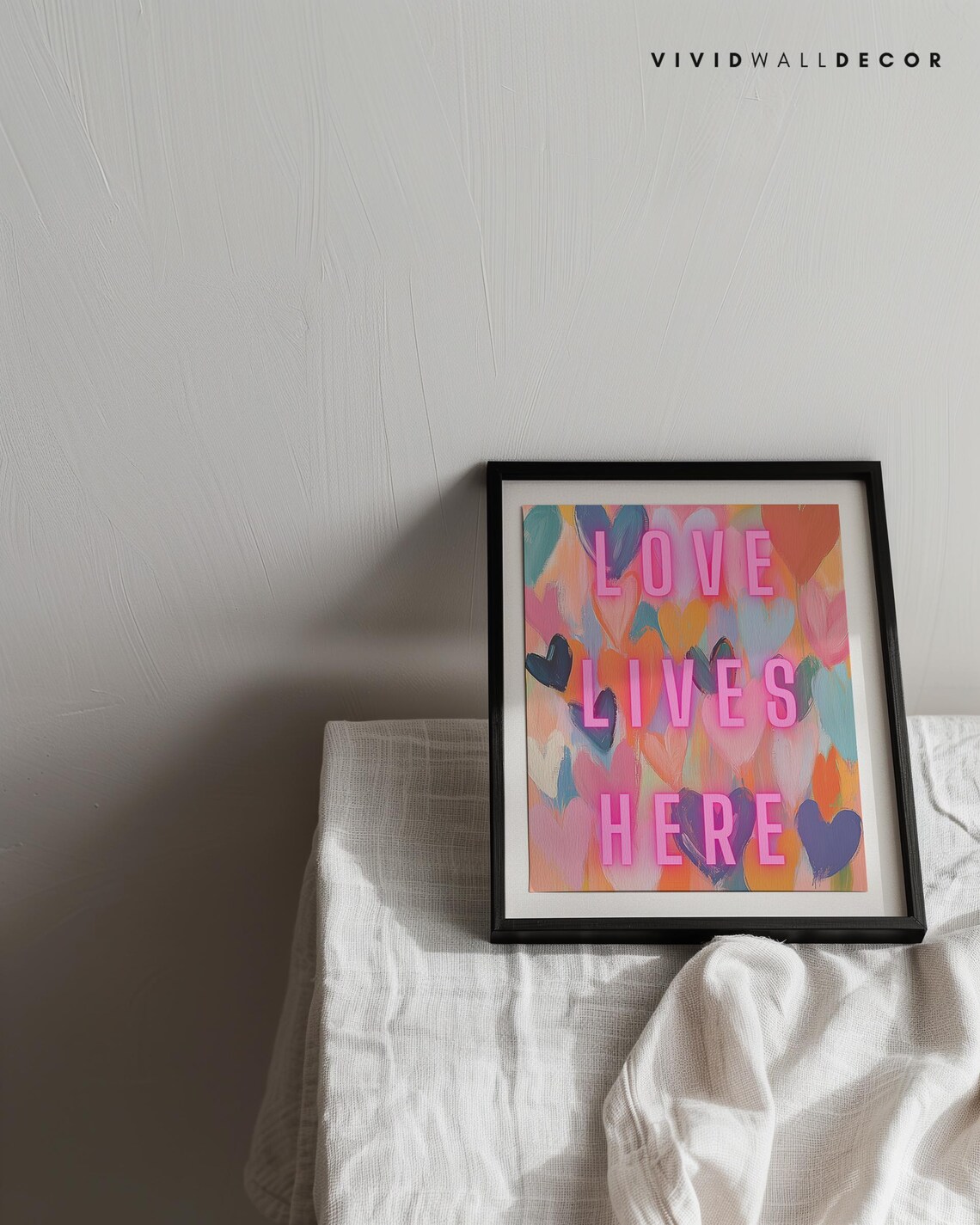 Love Lives Here in Glowing Pink Neon Over Painted Hearts Poster - Image 2