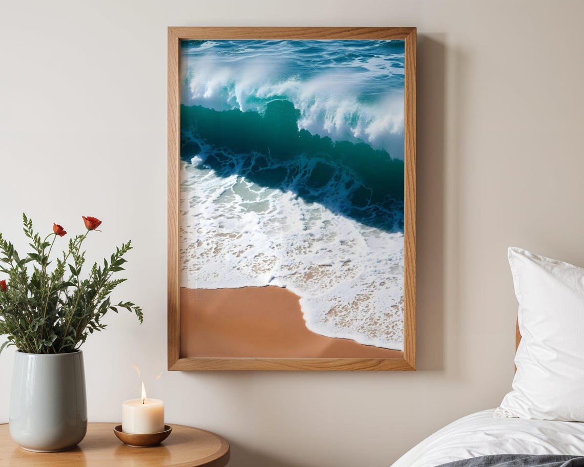 Turquoise Ocean Wave Breaking Over Golden Sandy Shore Poster