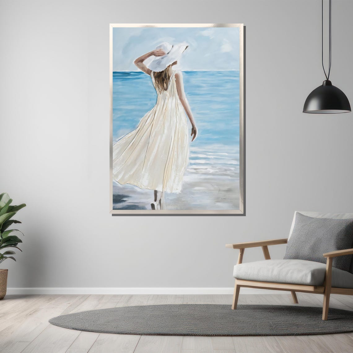Woman in White Dress and Hat Walking on a Tranquil Beach Poster - Image 3