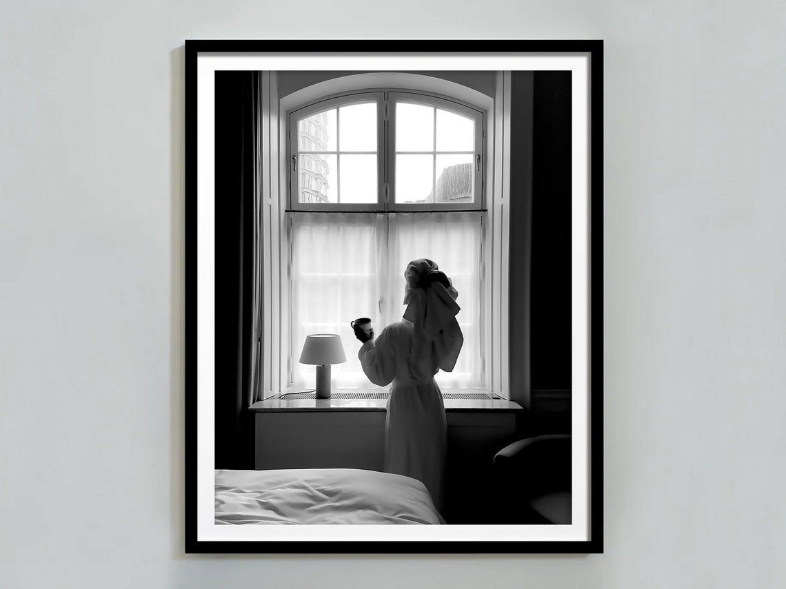 Woman in Robe Drinking Coffee by Window Black and White Photo Poster