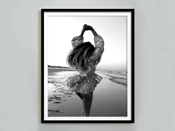 Woman Dancing on Beach in Sparkly Dress Black and White Photo Poster