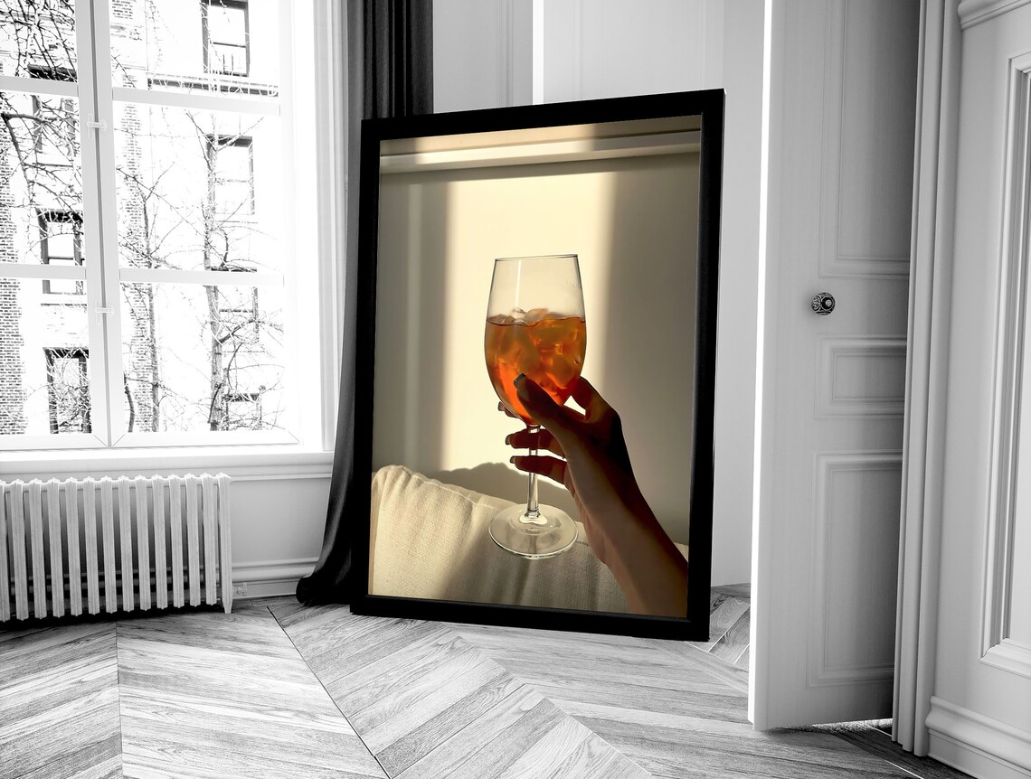 Hand Holding Aperol Spritz Glass in Sunlight Warm Bar Photo Poster - Image 4