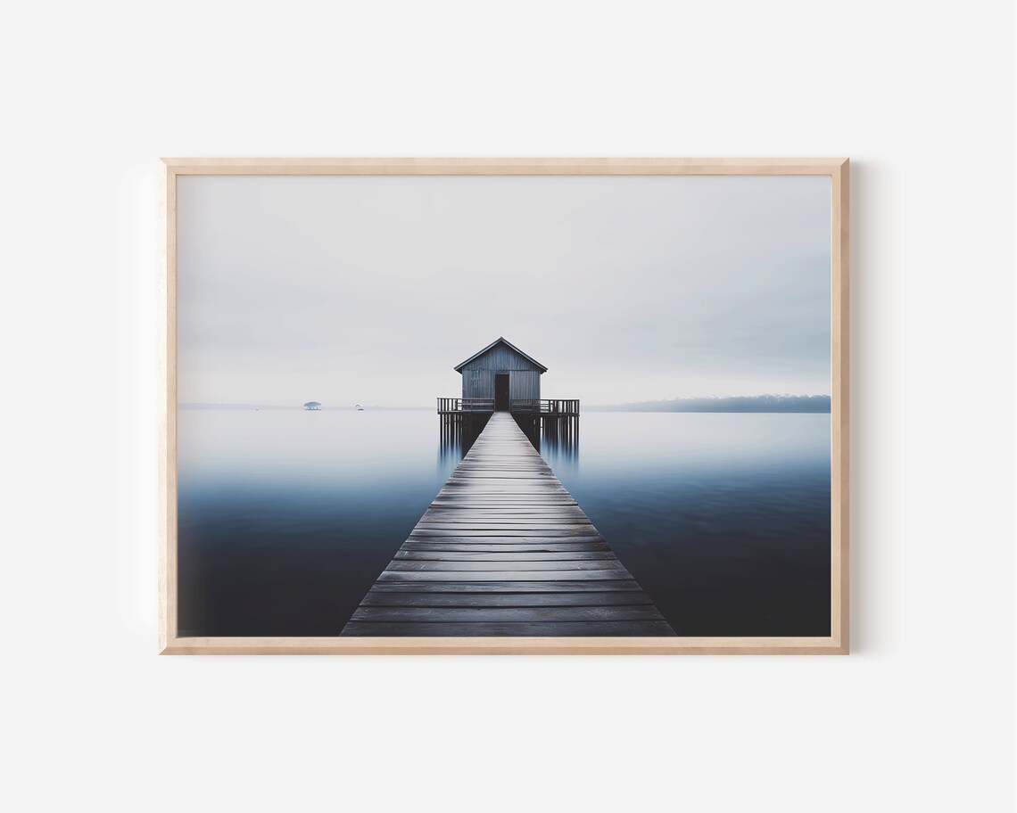 Minimalist Boathouse at End of Wooden Pier on Still Blue Water Poster - Image 3