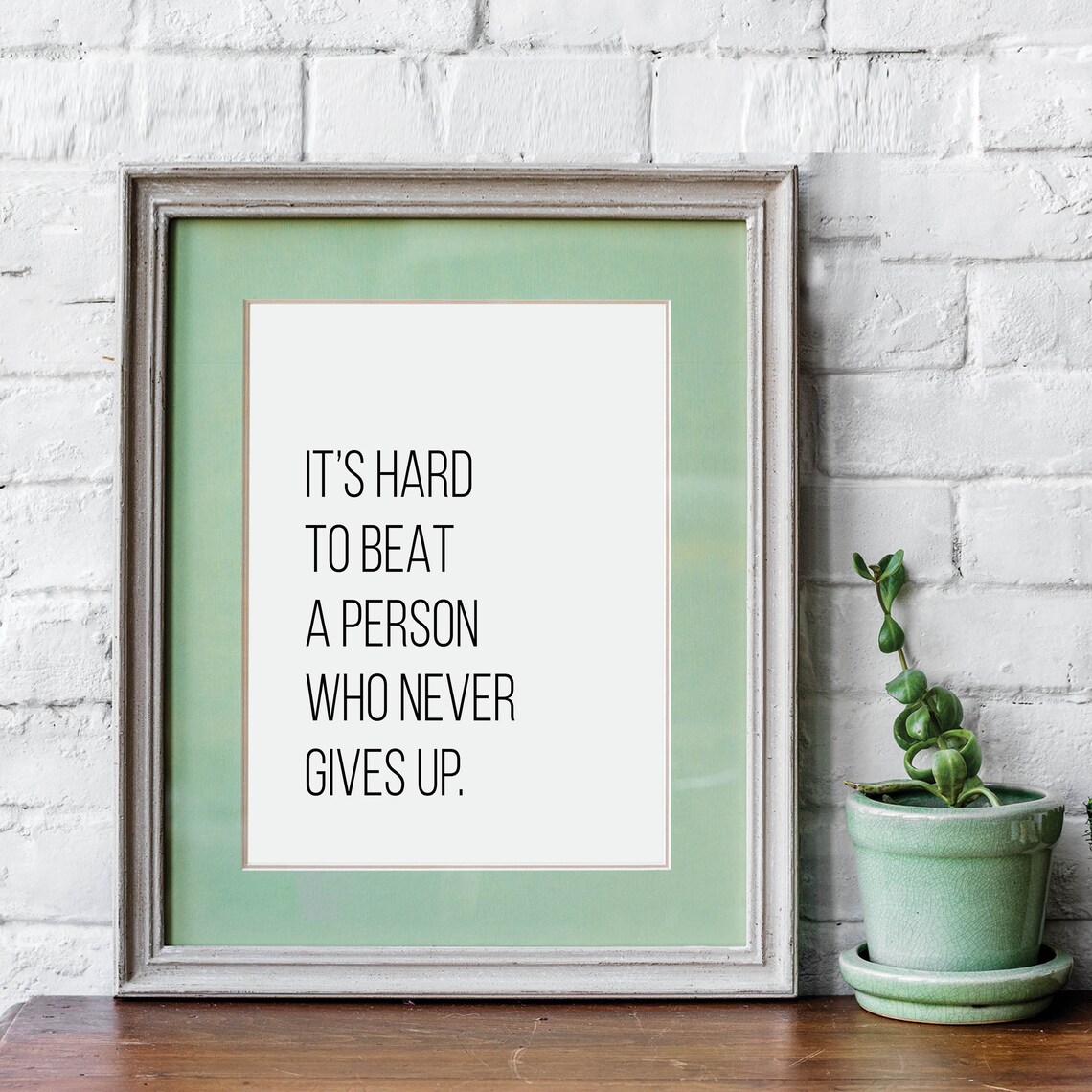 It Is Hard to Beat a Person Who Never Gives Up Motivational Quote Poster
