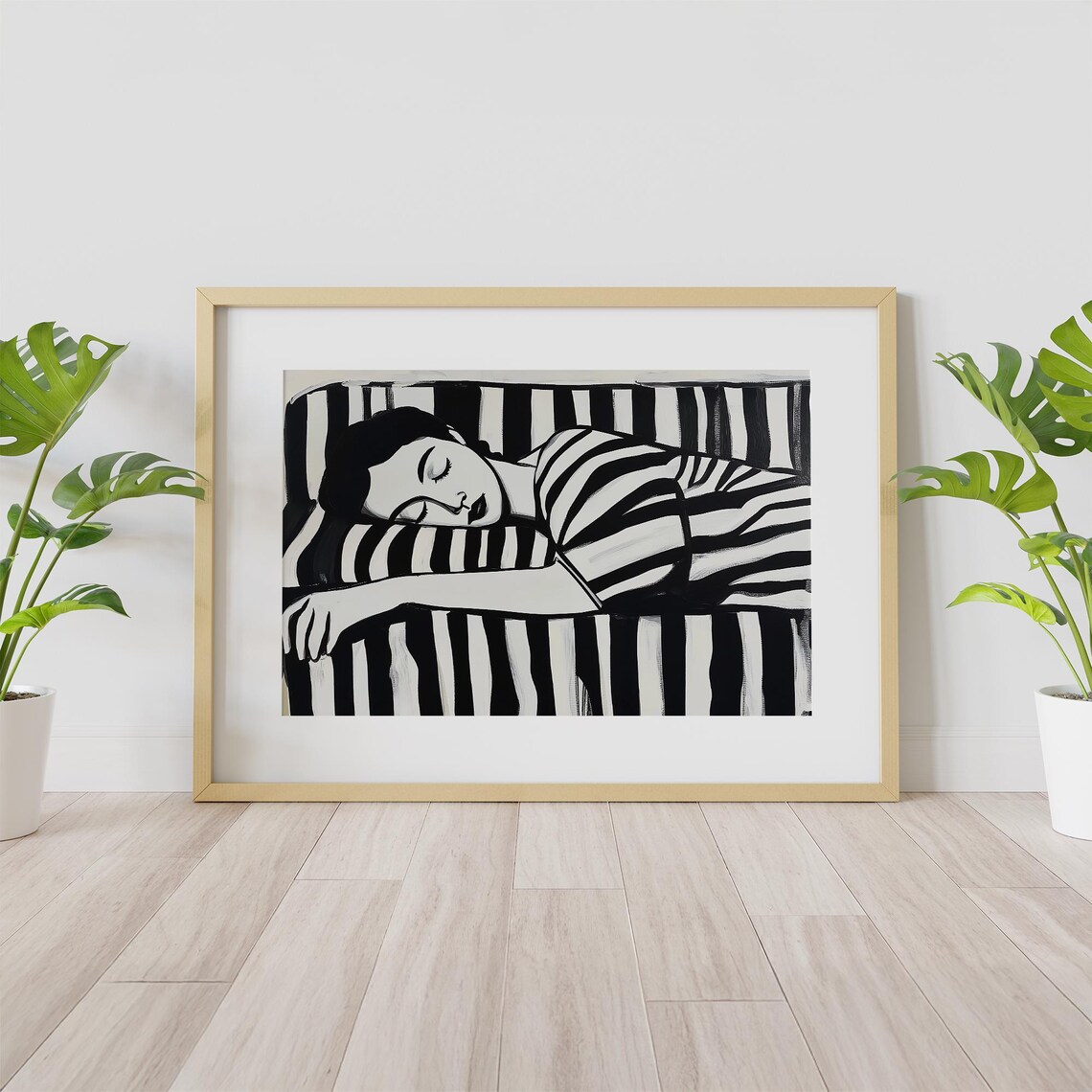 Reclining Monochrome Woman Sleeping Wrapped In Bold Stripes Print - Image 4