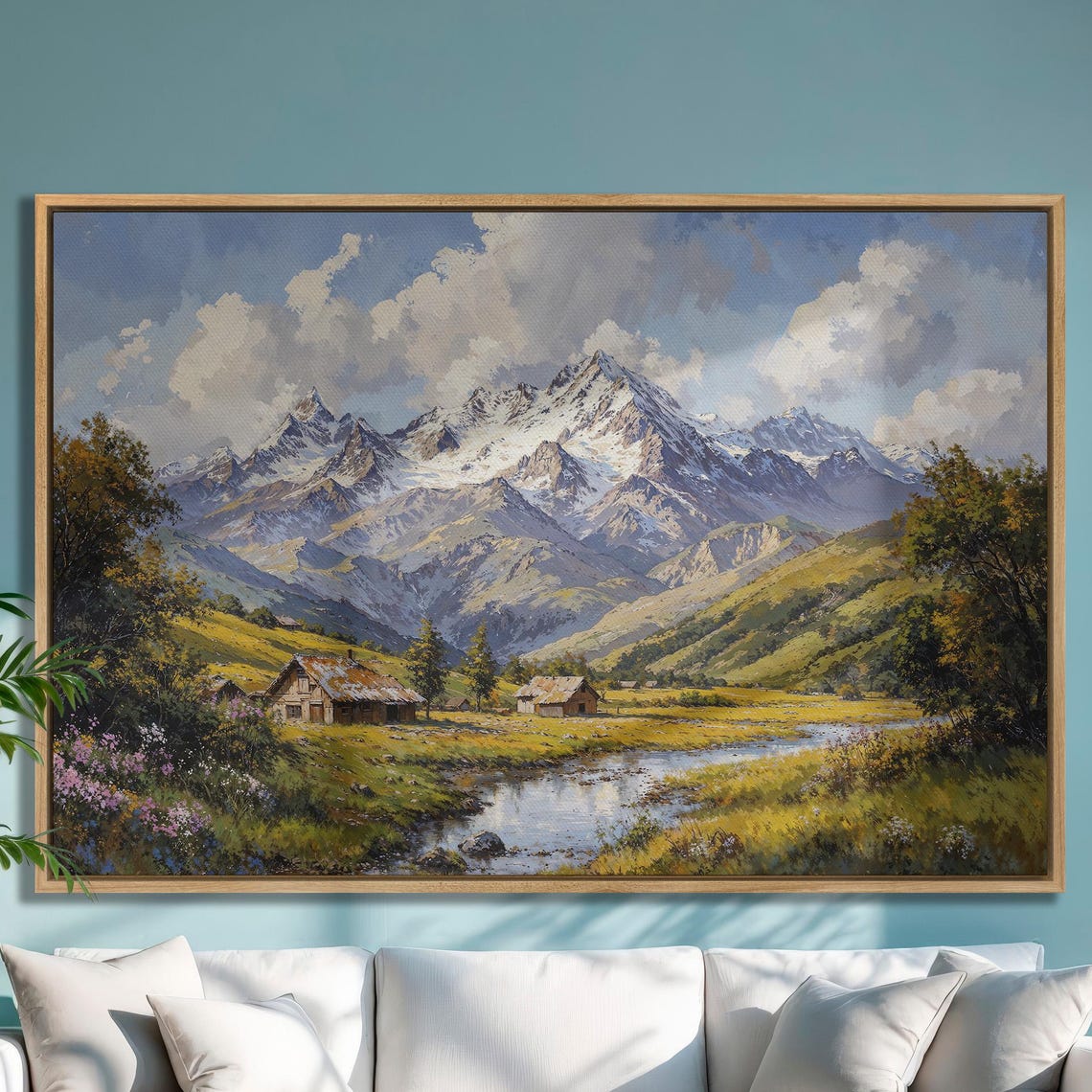 Alpine Cabins by a Creek Below Snow Capped Mountain Peaks Poster