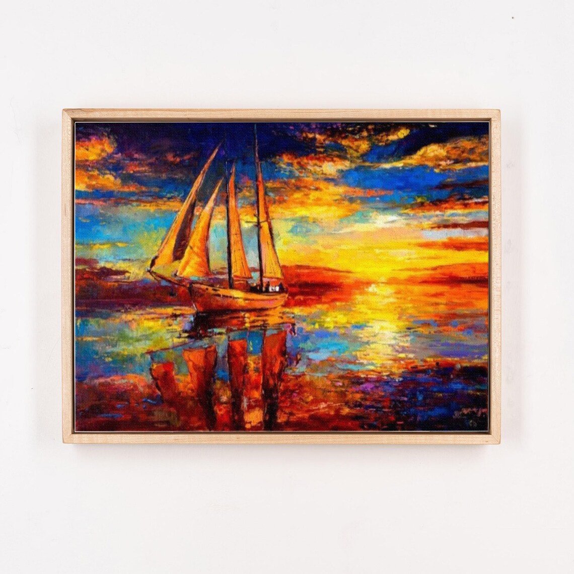 Lone Sailboat Sailing At A Fiery Orange Sunset On The Sea Poster - Image 4