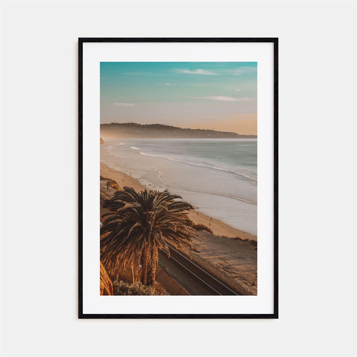 Palm Tree Overlooking Golden Sunset Beach with Gentle Waves Poster