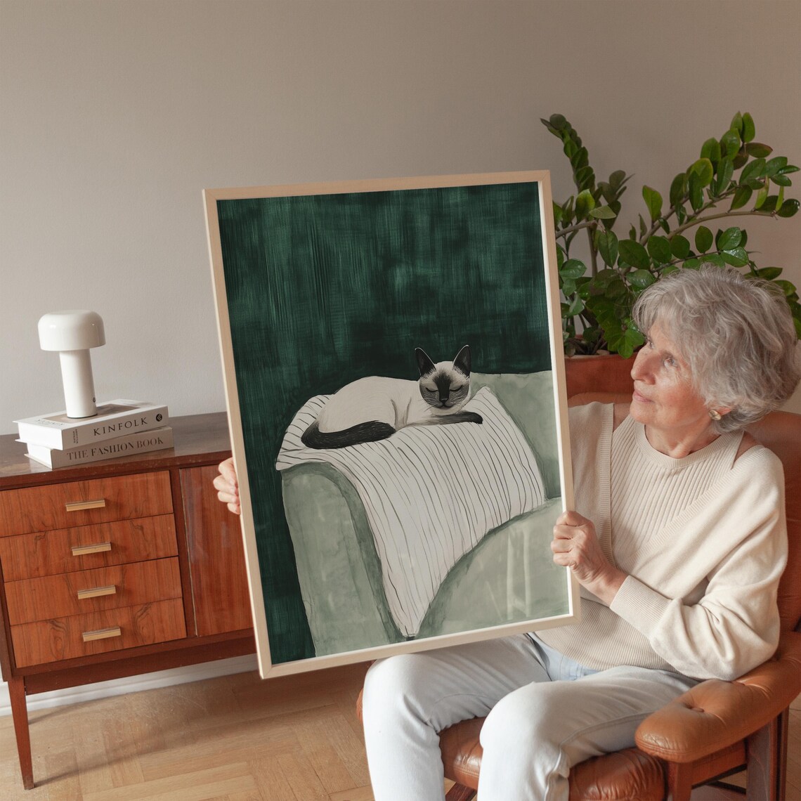 Elegant Siamese Cat Resting On Striped Blanket Green Chair Poster - Image 2