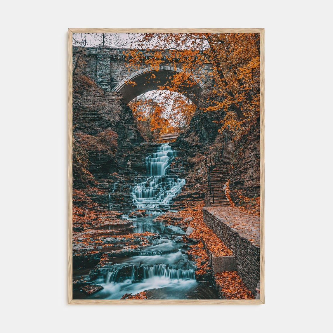 Stone Arch Bridge Spanning an Autumn Waterfall Gorge Scene Poster