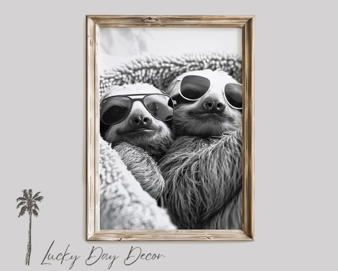 Two Cool Sloths in Sunglasses Black and White Cuddled Under Blanket Poster