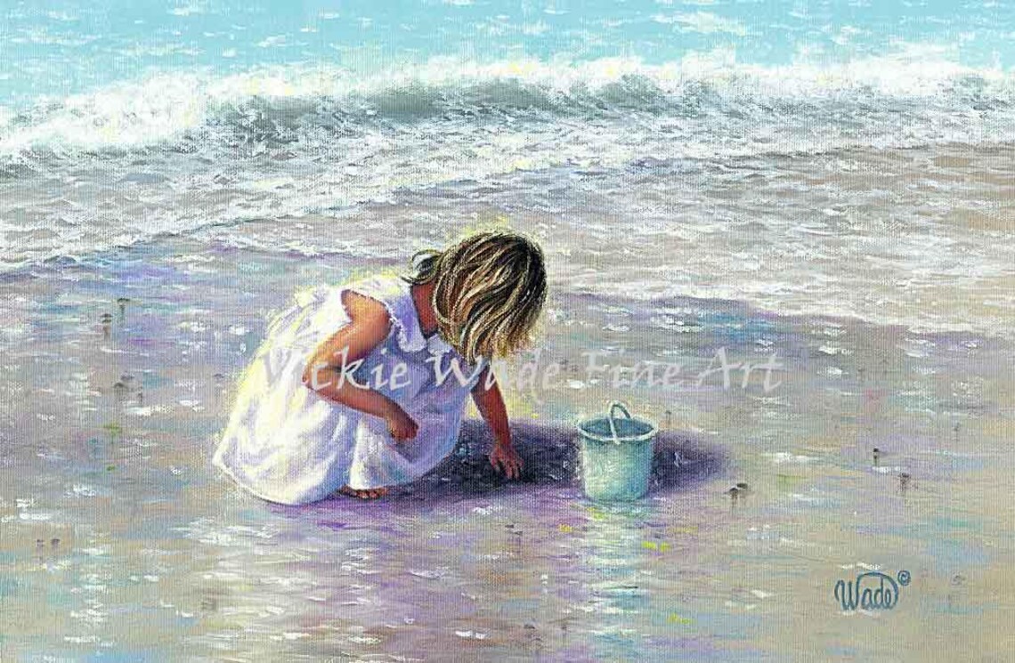 Little Blonde Girl Playing on the Beach With a Bucket Poster