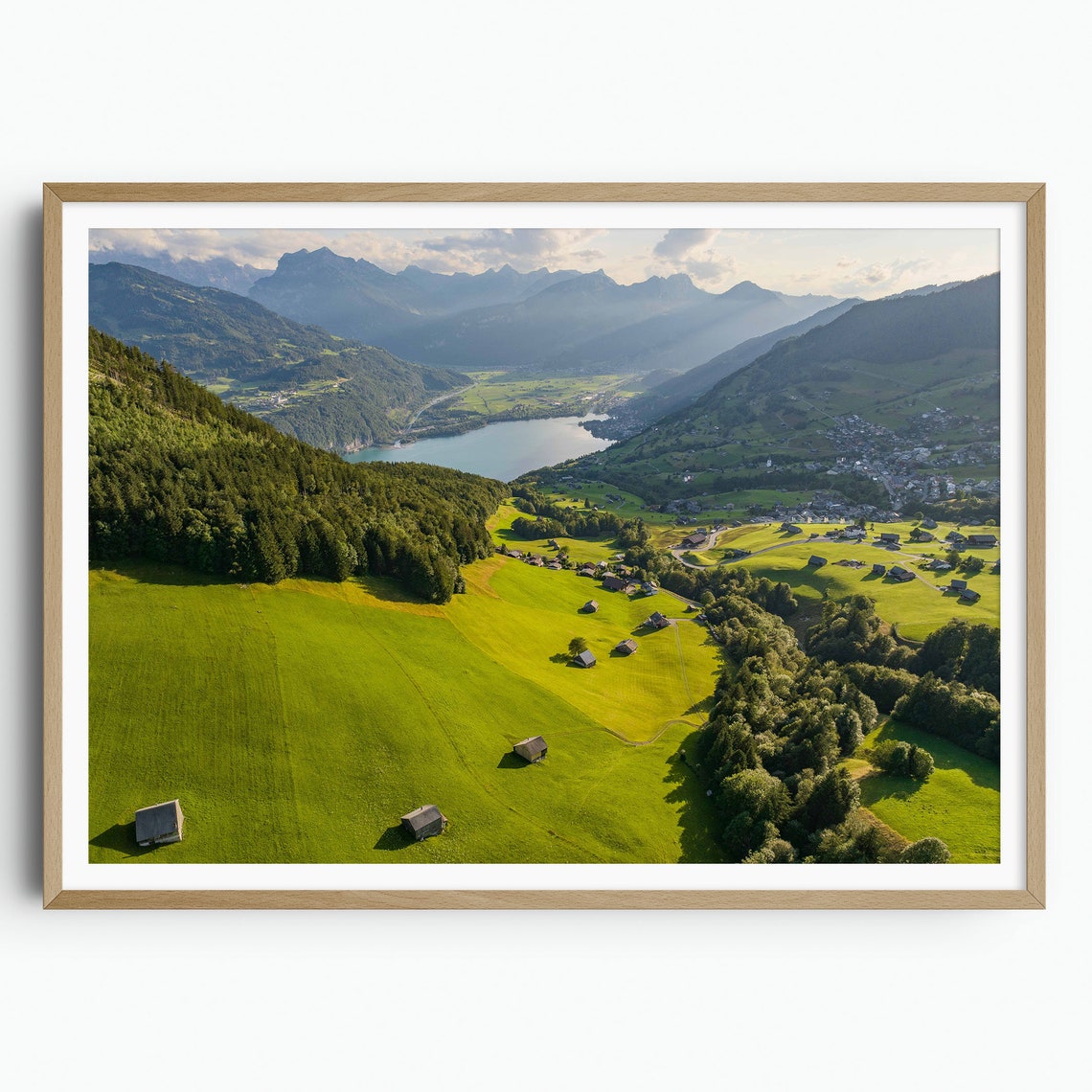 Swiss Alps Green Valley Lake And Chalets Under Mountain Peaks Poster