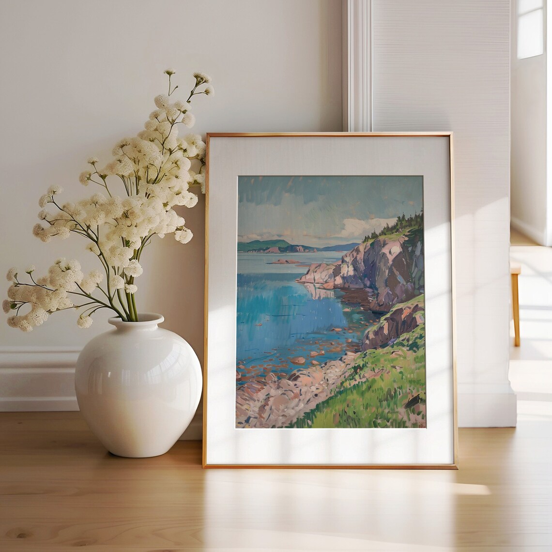 Rocky Coastal Cliffs Above A Bright Turquoise Sea Under Clear Sky Poster