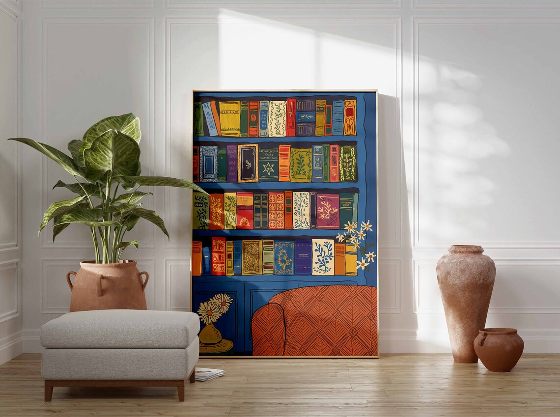 Blue Bookshelf With Orange Armchair Cozy Library Wall Poster - Image 3