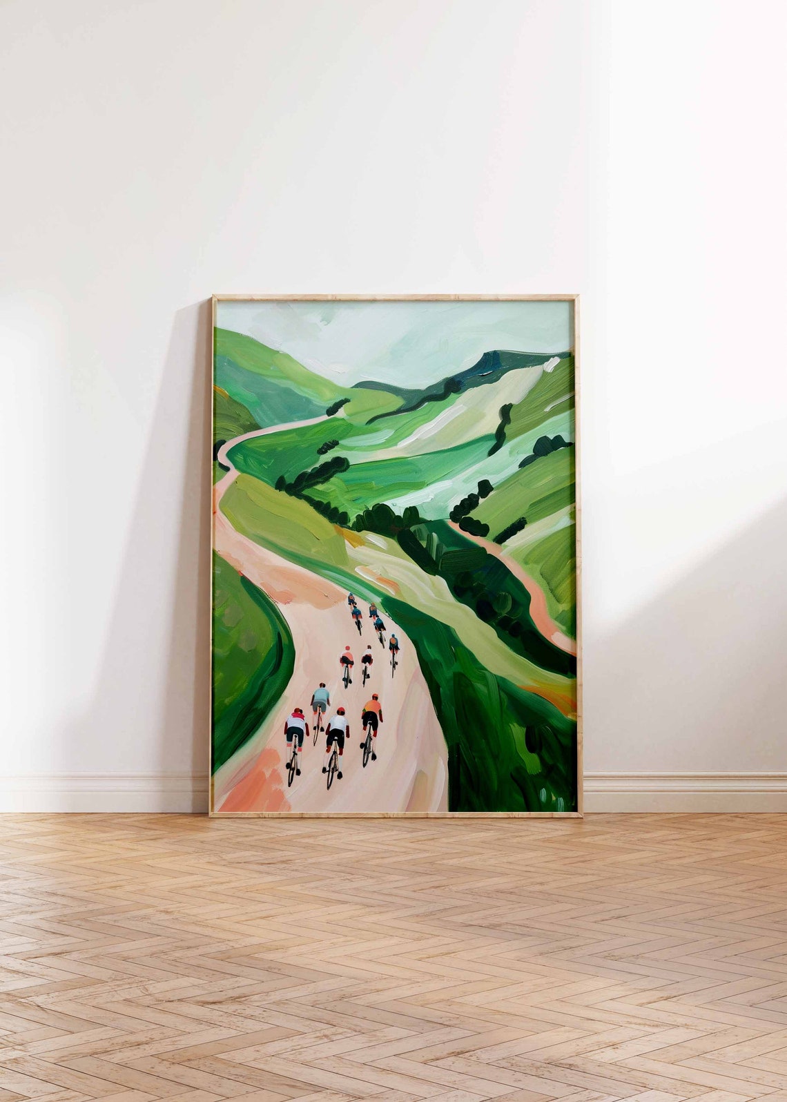 Cycling Peloton on Winding Road Through Green Rolling Hills Poster - Image 2