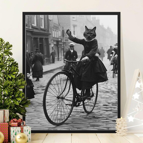 Victorian Cat Riding a Bicycle Down Cobblestone Street Sepia Poster
