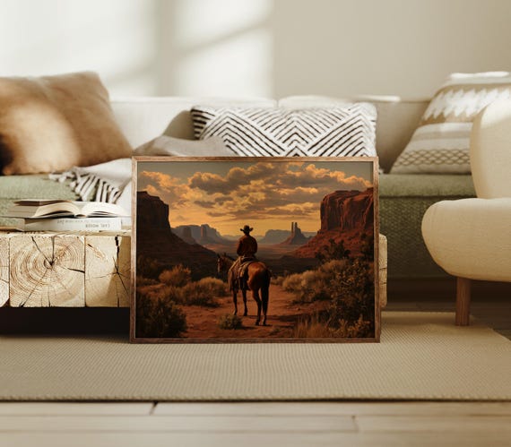 Cowboy On Horseback Overlooking Monument Valley Sunset