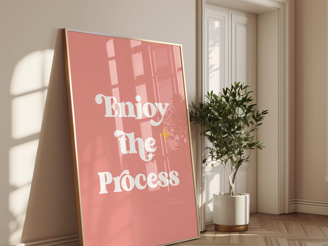 Enjoy The Process White Script Pink Background Motivational Poster