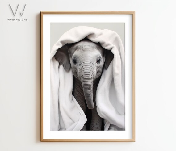 Adorable Baby Elephant Wrapped in a Fluffy White Towel Poster